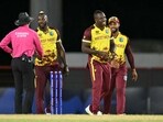 Rovman West Indies' captain Rovman Powell (C) celebrates dismissing Afghanistan's captain Rashid Khan Rovman West Indies' captain Rovman Powell (C) celebrates dismissing Afghanistan's captain Rashid Khan