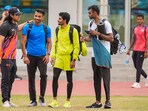 Neeraj Chopra interacts with fellow athletes ahead of the men's Javelin Throw event