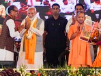 Varanasi: Prime Minister Narendra Modi being greeted by union minister Shivraj Singh Chouhan during the Kisan Samman Sammelan. Varanasi: Prime Minister Narendra Modi being greeted by union minister Shivraj Singh Chouhan during the Kisan Samman Sammelan.