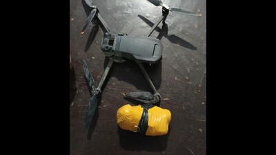 A drone and heroin seized by the BSF and police personnel in Amritsar.