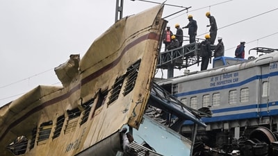 Indian Railway engineers inspect the accident site of Kanchanjunga Express passenger train at Rangapani in India's West Bengal state on June 18, 2024. (AFP) Indian Railway engineers inspect the accident site of Kanchanjunga Express passenger train at Rangapani in India's West Bengal state on June 18, 2024. (AFP)