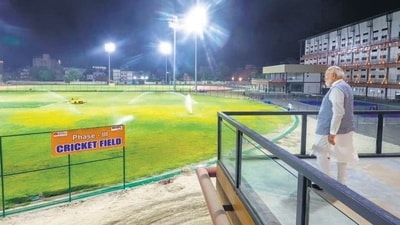 PM Modi reviews the progress of construction work at the Dr Sampurnanand Sports Stadium on Tuesday. (PTI) PM Modi reviews the progress of construction work at the Dr Sampurnanand Sports Stadium on Tuesday. (PTI)