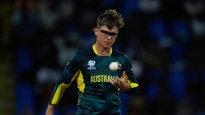 Australia's Adam Zampa tosses a ball while bowling against Namibia during an ICC Men's T20 World Cup cricket match at Sir Vivian Richards Stadium in North Sound, Antigua and Barbuda (PTI) Australia's Adam Zampa tosses a ball while bowling against Namibia during an ICC Men's T20 World Cup cricket match at Sir Vivian Richards Stadium in North Sound, Antigua and Barbuda (PTI)