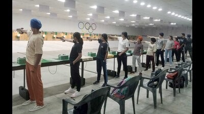 Participants during the 32nd district shooting championship at Govind National College in Narangwal, Ludhiana, on Tuesday. (HT Photo)