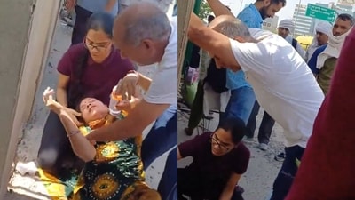 UPSC aspirant comforting her mother, who fell unconscious at the exam centre in Gurugram. (X/@333maheshwariii) UPSC aspirant comforting her mother, who fell unconscious at the exam centre in Gurugram. (X/@333maheshwariii)