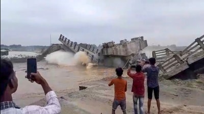 A bridge collapses into the Bakra river at Padkiya Ghat, in the Sikti block area of Araria, Bihar, Tuesday, June 18, 2024. (PTI) A bridge collapses into the Bakra river at Padkiya Ghat, in the Sikti block area of Araria, Bihar, Tuesday, June 18, 2024. (PTI)
