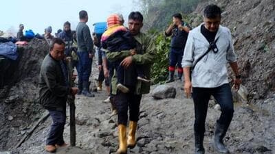 tranded tourists being evacuated in rain-hit Sikkim's Mangan district on Tuesday. (PTI) tranded tourists being evacuated in rain-hit Sikkim's Mangan district on Tuesday. (PTI)