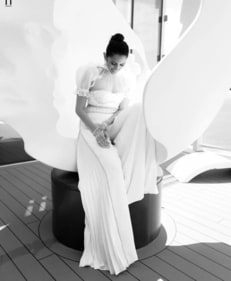 Shloka's elegant all-white ensemble exudes grace and charm. (Instagram/@ambani_update) Shloka's elegant all-white ensemble exudes grace and charm. (Instagram/@ambani_update)