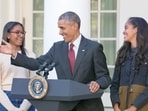 Former US President Barack Obama with daughters Sasha and Malia. Former US President Barack Obama with daughters Sasha and Malia.