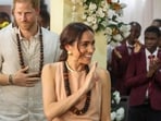 Prince Harry ‘homesick’ but Meghan Marke feels ‘rejected by the UK' (Photo by Kola SULAIMON / AFP)