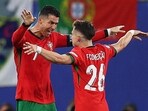 Portugal's forward Cristiano Ronaldo and second goal-scorer, Portugal's forward #26 Francisco Conceicao celebrate Portugal's forward Cristiano Ronaldo and second goal-scorer, Portugal's forward #26 Francisco Conceicao celebrate