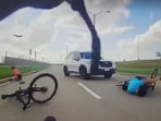Terrifying video shows brazen driver ramming into cyclists near Dallas-Fort Worth Airport in Texas