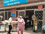 Patients being admitted due to heat stroke and exhaustion at LNJP hospital, in New Delhi, Patients being admitted due to heat stroke and exhaustion at LNJP hospital, in New Delhi,