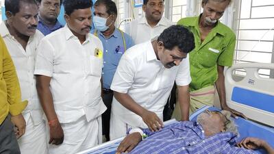 A person undergoes treatment after consumption of spurious liquor in Kallakurichi distict of Tamil Nadu on Wednesday. (PTI) A person undergoes treatment after consumption of spurious liquor in Kallakurichi distict of Tamil Nadu on Wednesday. (PTI)