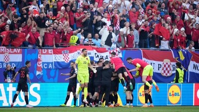 Albania players celebrate after teammate Albania's Klaus Gjasula scored their side's second goal during a Group B match between Croatia and Albania at the Euro 2024 soccer tournament in Hamburg, Germany, Wednesday (AP) Albania players celebrate after teammate Albania's Klaus Gjasula scored their side's second goal during a Group B match between Croatia and Albania at the Euro 2024 soccer tournament in Hamburg, Germany, Wednesday (AP)