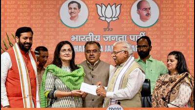 Former Congress leader Kiran Choudhry and her daughter Shruti (extreme right) joining the BJP in the presence of Union minister for energy, housing and urban development Manohar Lal Khattar, Haryana chief minister Nayab Singh Saini and party national general secretary Tarun Chugh at the party headquarters in New Delhi on Wednesday. (ANI Photo) Former Congress leader Kiran Choudhry and her daughter Shruti (extreme right) joining the BJP in the presence of Union minister for energy, housing and urban development Manohar Lal Khattar, Haryana chief minister Nayab Singh Saini and party national general secretary Tarun Chugh at the party headquarters in New Delhi on Wednesday. (ANI Photo)