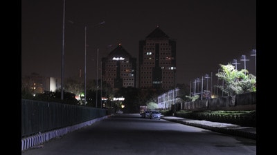 High-rise building and street lights in dark for promote energy conservation by turning off all non-essential lights (HT File)