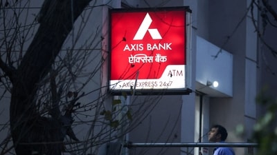 A man enters a branch of Axis Bank in New Delhi, India. (Reuters)