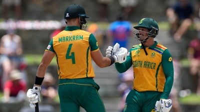 South Africa's captain Aiden Markram, left, and Quinton de Kock celebrate the partnership of 100 runs (PTI) South Africa's captain Aiden Markram, left, and Quinton de Kock celebrate the partnership of 100 runs (PTI)