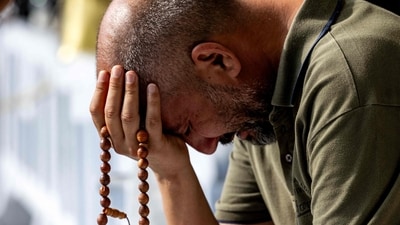 A man prays as he and other Muslim pilgrims perform the farewell circumambulation or "tawaf". (AFP) A man prays as he and other Muslim pilgrims perform the farewell circumambulation or "tawaf". (AFP)