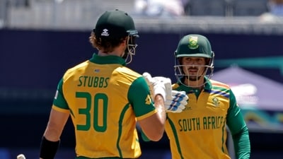 South Africa's Quinton de Kock, right, and batting parter Tristan Stubbs celebrate scoring runs (AP) South Africa's Quinton de Kock, right, and batting parter Tristan Stubbs celebrate scoring runs (AP)