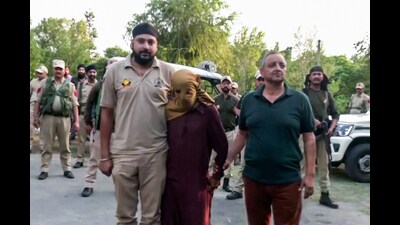 ammu and Kashmir's Reasi Police has arrested a man named Hakam Din, who was involved in the Reasi terror attack case, on Wednesday. As per the police, he worked for the terrorists as guide and gave them shelter. (ANI)