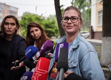 Alexandra Vashchuk, who was in a relationship with Gordon Black, a U.S. Army staff sergeant detained in Russia on May 2 on suspicion of stealing from her, speaks with reporters in front of a court building after a hearing, in Vladivostok, Russia, June 6, 2024. REUTERS/Tatiana Meel (REUTERS)