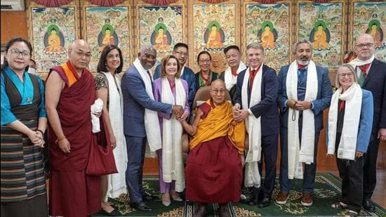 Tibetan spiritual leader the Dalai Lama with former US House of Representatives Speaker Nancy Pelosi and other members of the US Congressional delegation after a meeting in McLeodganj near Dharamshala on Wednesday. (PTI Photo)