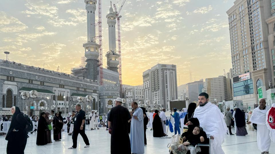 A pilgrim pushes his wife and child in a wheelchair at the Grand Mosque, ahead of the annual haj pilgrimage, in Mecca (REUTERS) A pilgrim pushes his wife and child in a wheelchair at the Grand Mosque, ahead of the annual haj pilgrimage, in Mecca (REUTERS)
