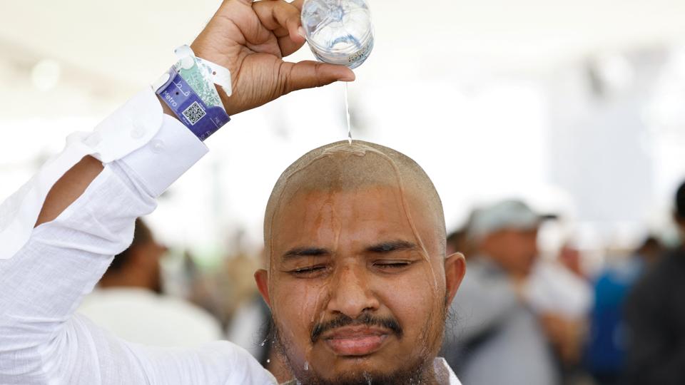 Muslim pilgrim pours water on his head to cool down from the heat, as he takes part in the annual haj pilgrimage in Mina, Saudi Arabia (REUTERS) Muslim pilgrim pours water on his head to cool down from the heat, as he takes part in the annual haj pilgrimage in Mina, Saudi Arabia (REUTERS)