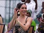Meghan Markle watches her husband Prince Harry play in an exhibition sitting volleyball match, in Abuja, Nigeria, Saturday, May 11, 2024.s. (AP Photo/Sunday Alamba)