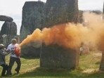 After environmental activists sprayed an orange substance on Stonehenge, a UNESCO world heritage site in southwest England, police arrested two people on Wednesday. After environmental activists sprayed an orange substance on Stonehenge, a UNESCO world heritage site in southwest England, police arrested two people on Wednesday.