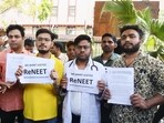 Students holding placards protest against the alleged irregularities in the NEET examination in New Delhi. (ANI file) Students holding placards protest against the alleged irregularities in the NEET examination in New Delhi. (ANI file)