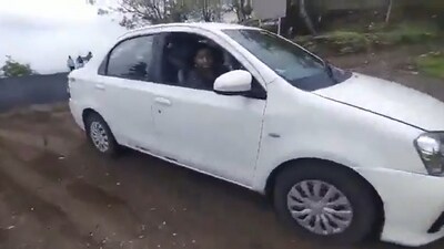 Woman dies after reversing car into valley; male friend charged for negligence (Screengrab)