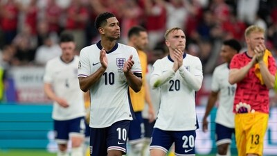 England's Jude Bellingham, left, Jarrod Bowen, center, and goalkeeper Aaron Ramsdale greet supporters at the end of a Group C match between Denmark and England at the Euro 2024 soccer tournament in Frankfurt (AP) England's Jude Bellingham, left, Jarrod Bowen, center, and goalkeeper Aaron Ramsdale greet supporters at the end of a Group C match between Denmark and England at the Euro 2024 soccer tournament in Frankfurt (AP)