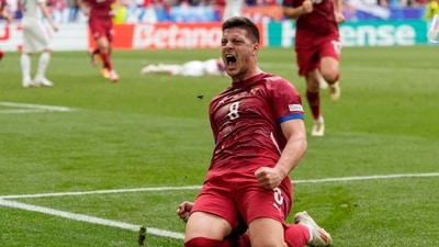 Serbia's Luka Jovic celebrates after scoring his side first goal during a Group C match between Slovenia and Serbia at the Euro 2024 soccer tournament in Munich, Germany (AP) Serbia's Luka Jovic celebrates after scoring his side first goal during a Group C match between Slovenia and Serbia at the Euro 2024 soccer tournament in Munich, Germany (AP)