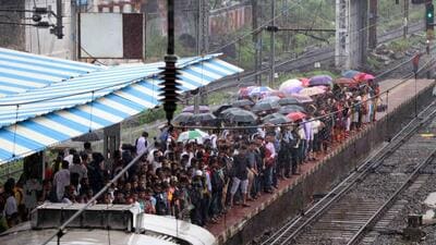 Kalyan, India – July 4, 2019: Dombivali Commuters have complaint of leaking roofs during monsoon. the commuters claimed that the portion near the CSMT side women compartment of the train has no roof due to which they are drenched while boarding or alighting the train at platform no 5 dombivili station in kalyan, India, on Thursday, July 4, 2019. (Photo by Rishikesh Choudhary/ Hindustan Times (HT PHOTO) Kalyan, India – July 4, 2019: Dombivali Commuters have complaint of leaking roofs during monsoon. the commuters claimed that the portion near the CSMT side women compartment of the train has no roof due to which they are drenched while boarding or alighting the train at platform no 5 dombivili station in kalyan, India, on Thursday, July 4, 2019. (Photo by Rishikesh Choudhary/ Hindustan Times (HT PHOTO)