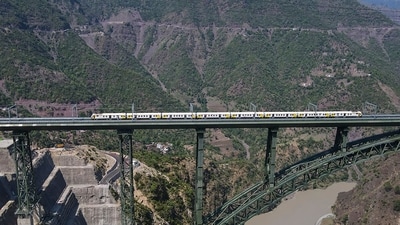 Reasi: Indian Railway conducts trial run on the world's highest railway bridge over Chenab in Reasi. (PTI) Reasi: Indian Railway conducts trial run on the world's highest railway bridge over Chenab in Reasi. (PTI)
