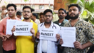 Students holding placards protest against the alleged irregularities in the NEET examination in New Delhi. (ANI file) Students holding placards protest against the alleged irregularities in the NEET examination in New Delhi. (ANI file)