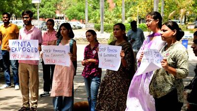 Students holding up placards during a protest at the Panjab University, Chandigarh. (Keshav Singh/HT) Students holding up placards during a protest at the Panjab University, Chandigarh. (Keshav Singh/HT)