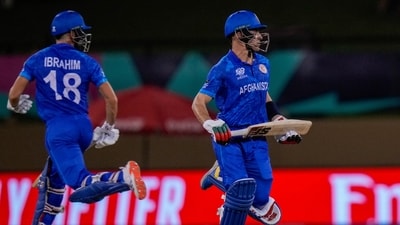 Afghanistan batsmen Rahmanullah Gurbaz, right, and teammate Ibrahim Zadran run between wickets (AP) Afghanistan batsmen Rahmanullah Gurbaz, right, and teammate Ibrahim Zadran run between wickets (AP)