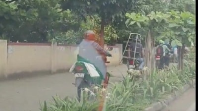 On camera, stream of two-wheelers ride on Bengaluru footpath to bypass traffic On camera, stream of two-wheelers ride on Bengaluru footpath to bypass traffic
