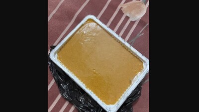 A doctor shared this image and wrote that it shows how her besan laddoos melted into a “cake” due to extreme Delhi heat. (X/@thisisbhumika) A doctor shared this image and wrote that it shows how her besan laddoos melted into a “cake” due to extreme Delhi heat. (X/@thisisbhumika)
