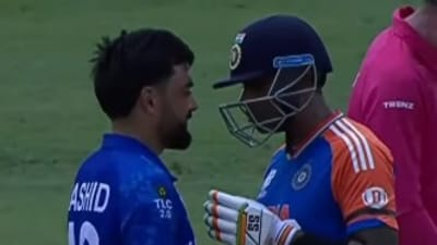 Rashid Khan talks to Suryakumar Yadav after being hit for boundaries (Instagram/ICC) Rashid Khan talks to Suryakumar Yadav after being hit for boundaries (Instagram/ICC)