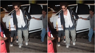 Shah Rukh Khan is back to his ponytail era and we cannot keep calm. The actor gave us all kinds of Don 2 vibes as he walked into the airport holding his son AbRam's hand. (HT Photos/Varinder Chawla) Shah Rukh Khan is back to his ponytail era and we cannot keep calm. The actor gave us all kinds of Don 2 vibes as he walked into the airport holding his son AbRam's hand. (HT Photos/Varinder Chawla)
