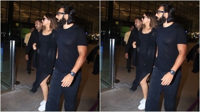 Deepika and Ranveer twinned in black and looked perfect together. Deepika decked up in a black bodycon dress with a black shrug with front open, while Ranveer looked ravishing in a black T-shirt and a black pair of trousers. (HT Photos/Varinder Chawla) Deepika and Ranveer twinned in black and looked perfect together. Deepika decked up in a black bodycon dress with a black shrug with front open, while Ranveer looked ravishing in a black T-shirt and a black pair of trousers. (HT Photos/Varinder Chawla)
