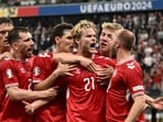 Denmark players celebrating after scoring the goal against England.