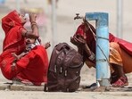 Women quench their thirst with the tap water on a hot summer afternoon during heatwave in Prayagraj. (File)