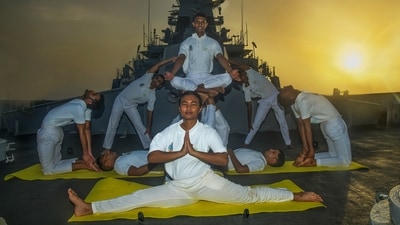 Mumbai, Jun 21 (ANI): Western Naval Command personnel perform yoga on the 10th International Day of Yoga, in Mumbai on Friday. (ANI Photo) (Deepak Salvi) Mumbai, Jun 21 (ANI): Western Naval Command personnel perform yoga on the 10th International Day of Yoga, in Mumbai on Friday. (ANI Photo) (Deepak Salvi)