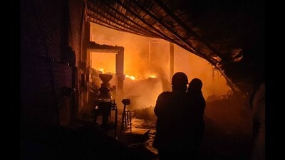 Firefighters trying to douse the flames at a plastic factory in Ladhowal area, Ludhiana, on Thursday. (Gurpreet Singh/HT)